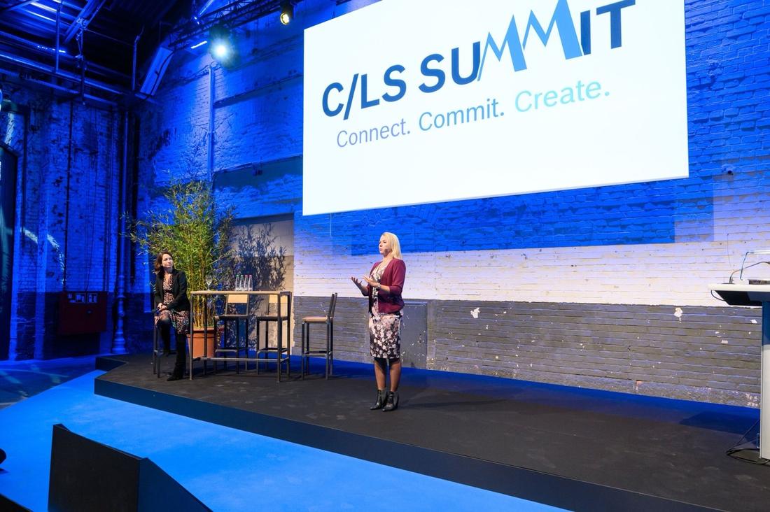 Barbara Zelenay speaking on stage