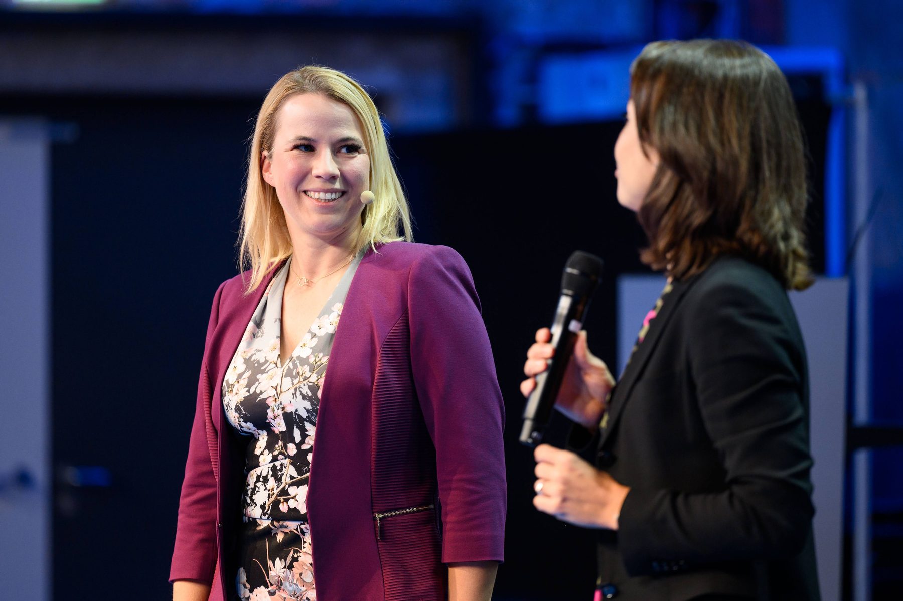 Barbara Zelenay moderating an on-stage interview