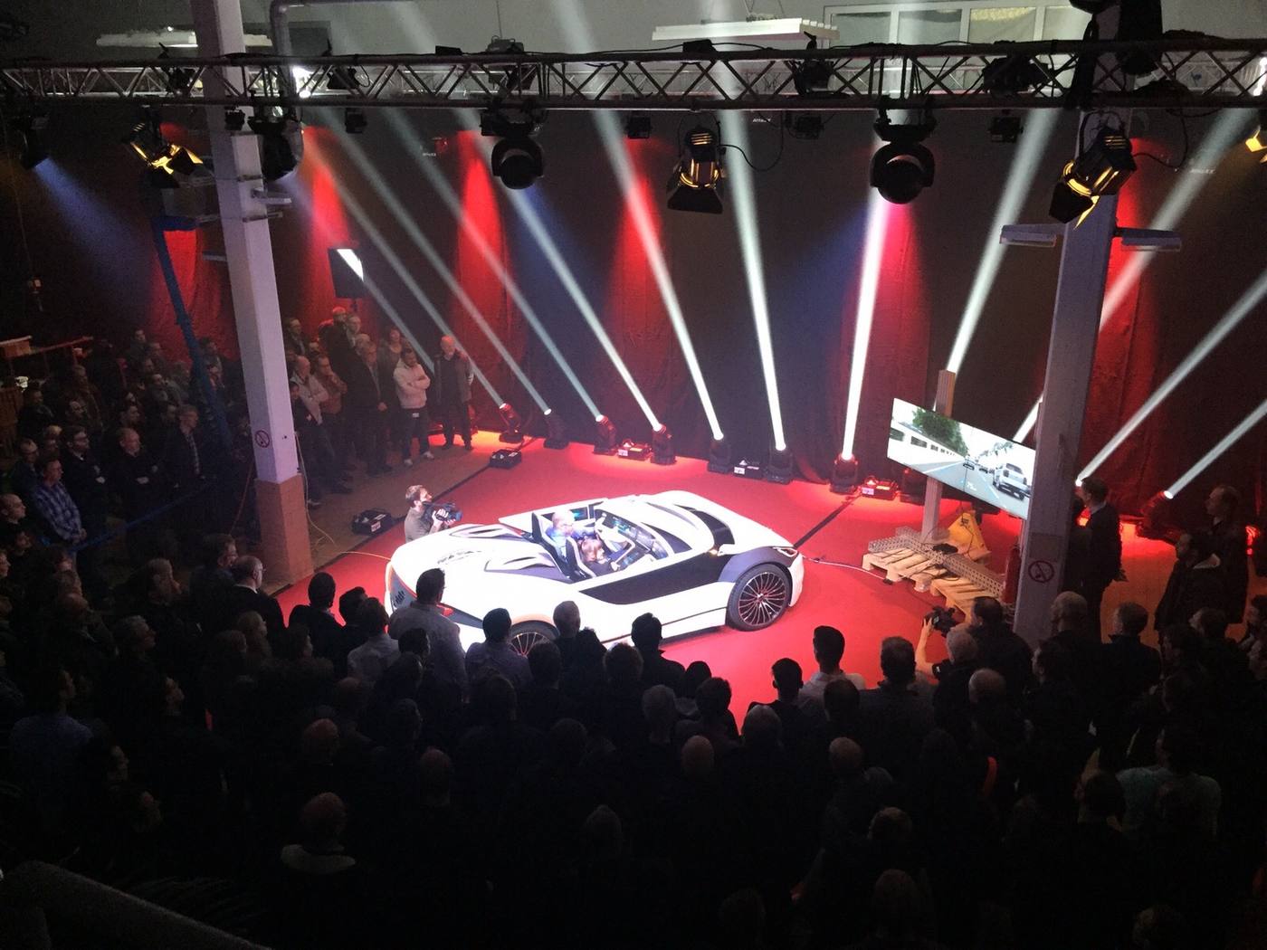 Large-scale automotive stage event with a car reveal