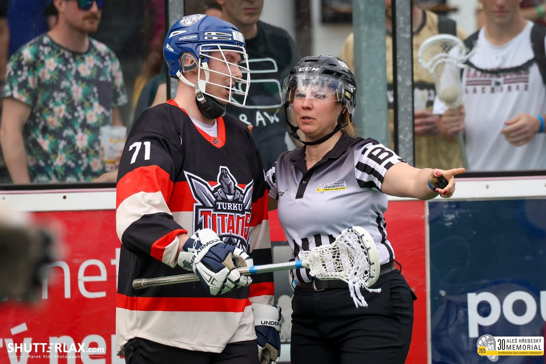 Barbara Zelenay refereeing at a lacrosse championship, photo by Shutterlax